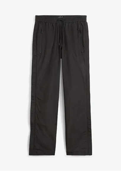 Ultraleichte Schlupf-Regenhose mit seitlichem Reißverschluss, wasserdicht in schwarz von vorne - bonprix