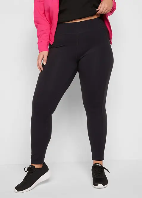 Ultrasofte Sport-Leggings mit seitlichen Taschen, knöchelfrei in schwarz von vorne - bonprix