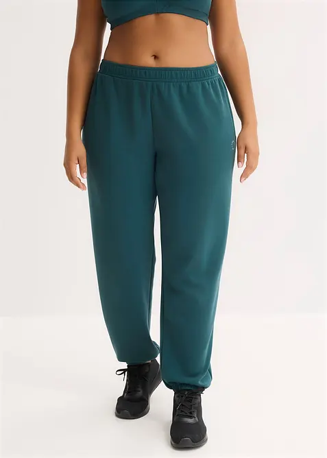 Ultrasofte Sport-Jogginghose mit Modal in petrol von vorne - bonprix