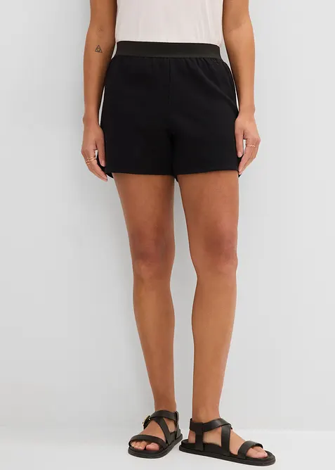 Sweat-Shorts mit abgerundetem Saum in schwarz von vorne - bonprix