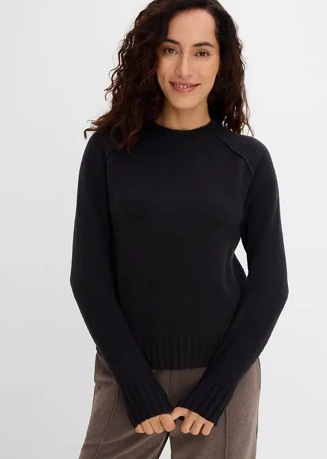 Raglan-Strickpullover in schwarz von vorne (im Anschnitt) - bonprix