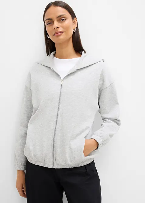 Kapuzen-Sweatjacke aus weichem Baumwoll-Mix in grau von vorne (im Anschnitt) - bonprix