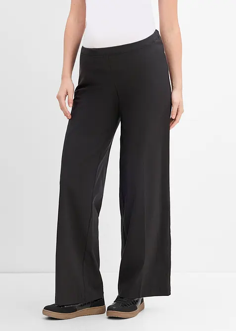 2-in-1 weite Stretch- Umstandshose für die Schwangerschaft und danach in schwarz von vorne - bonprix