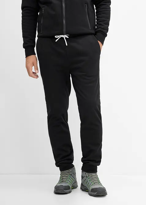 Thermo-Jogginghose mit flauschigem Teddyfleece in schwarz von vorne - bonprix