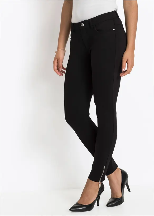 Treggings in schwarz von vorne - bonprix Treggings in schwarz von vorne - bonprix