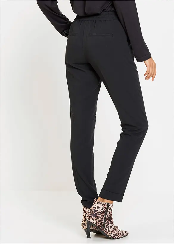 Bundfaltenhose in Schlupfform in schwarz von hinten - bonprix Bundfaltenhose in Schlupfform in schwarz von hinten - bonprix