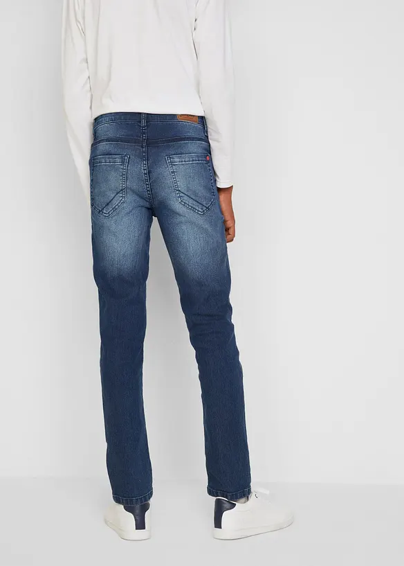 Jungen Jeans mit cooler Waschung, Slim Fit in blau von hinten - bonprix
