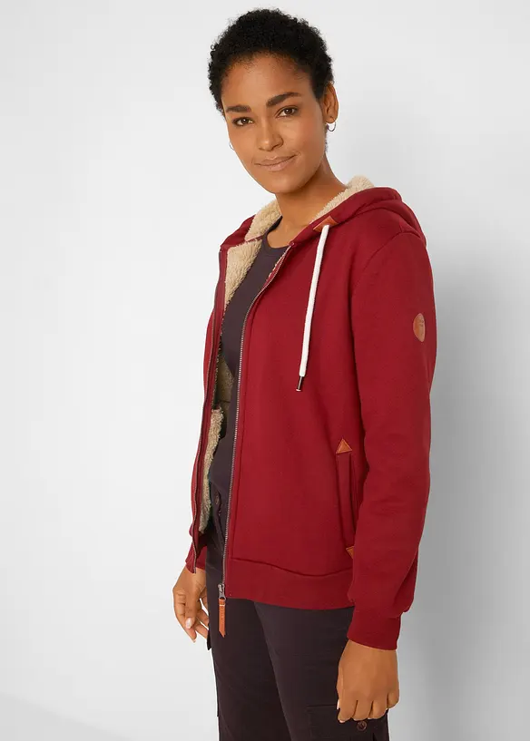 Kapuzen-Sweatjacke mit Teddyfutter in rot von vorne (im Anschnitt) - bonprix