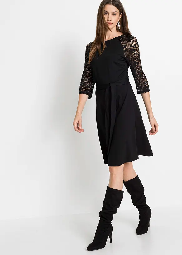 Jerseykleid mit ausgestelltem Rockteil in schwarz von vorne (Totalaufnahme) - bonprix