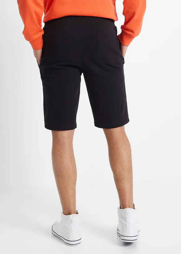 Sweat-Bermuda aus Baumwolle in Regular Fit in schwarz von hinten - bonprix