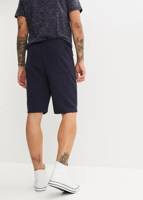 Sweat-Bermuda mit Reißverschlusstaschen in Regular Fit in blau von hinten - bonprix
