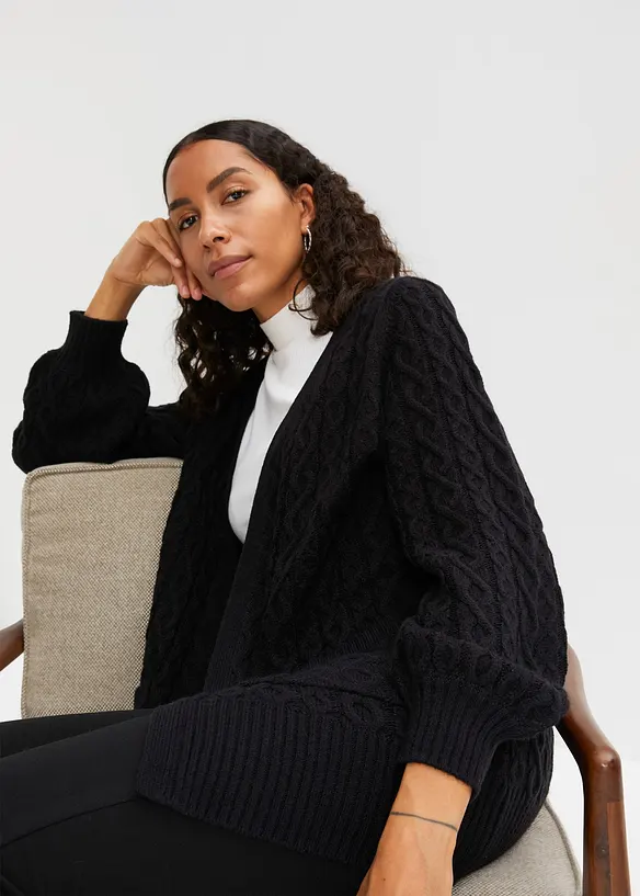 Longstrickjacke mit Ballonärmeln in schwarz von vorne (im Anschnitt) - bonprix Longstrickjacke mit Ballonärmeln in schwarz von vorne (im Anschnitt) - bonprix