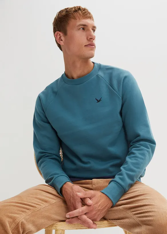 Sweatshirt aus weichem Baumwoll-Mix in petrol von vorne (im Anschnitt) - bonprix