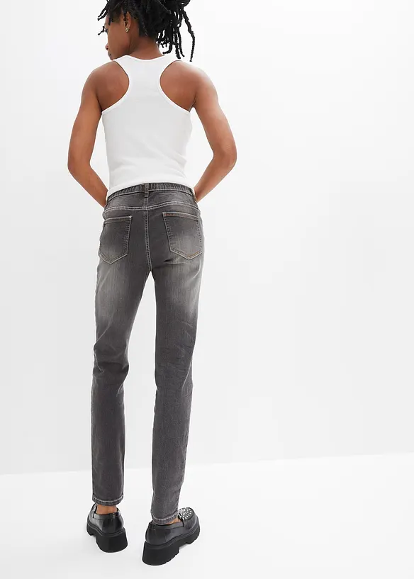 Jeggings in schwarz von hinten - bonprix