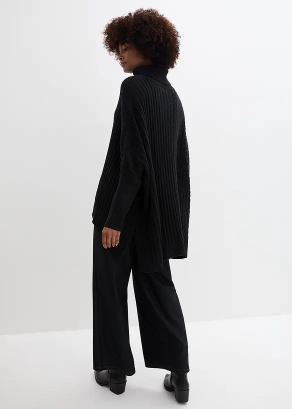 Oversize-Poncho Pullover in schwarz von hinten (im Anschnitt) - bonprix