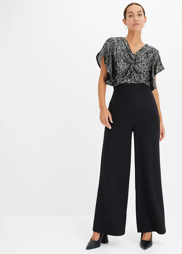 Jumpsuit mit funkelndem Wickeloberteil in schwarz von vorne (Totalaufnahme) - bonprix Jumpsuit mit funkelndem Wickeloberteil in schwarz von vorne (Totalaufnahme) - bonprix