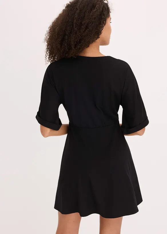 Tailliertes Minikleid in schwarz von hinten (Totalaufnahme) - bonprix Tailliertes Minikleid in schwarz von hinten (Totalaufnahme) - bonprix