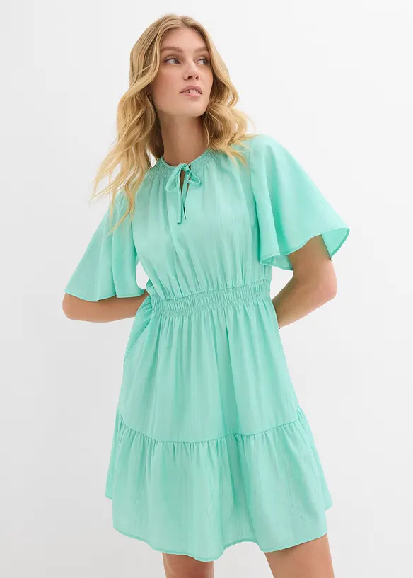 Minikleid aus fließendem Viskose-Mix in grün von vorne (Totalaufnahme) - bonprix Minikleid aus fließendem Viskose-Mix in grün von vorne (Totalaufnahme) - bonprix