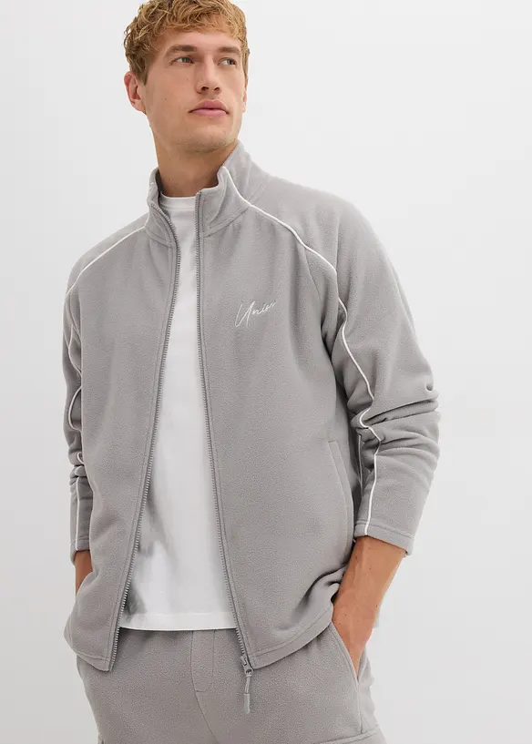 Wärmende Fleecejacke mit sportiven Details in grau von vorne (im Anschnitt) - bonprix