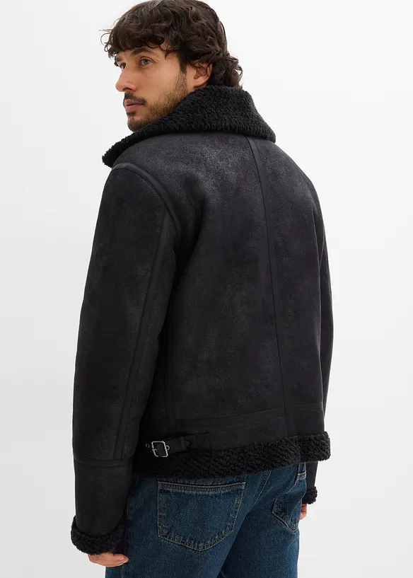 Lederimitat-Jacke mit Teddyfutter in schwarz von hinten (im Anschnitt) - bonprix