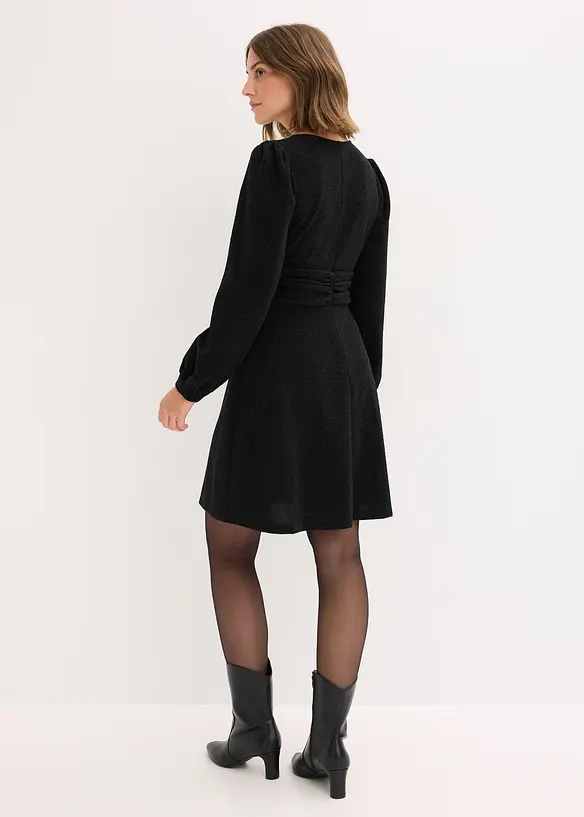 Minikleid mit V-Ausschnitt in schwarz von hinten (Totalaufnahme) - bonprix Minikleid mit V-Ausschnitt in schwarz von hinten (Totalaufnahme) - bonprix