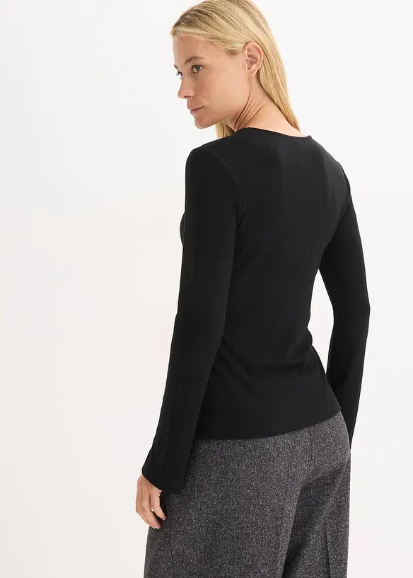 Geripptes Langarmshirt in schwarz von hinten (im Anschnitt) - bonprix