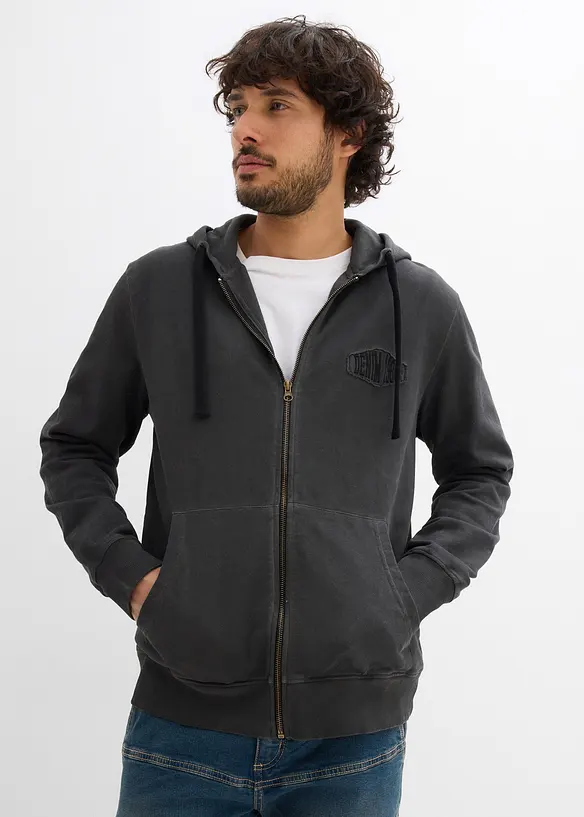 Kapuzen-Sweatjacke in ausgewaschener Optik in schwarz von vorne (im Anschnitt) - bonprix
