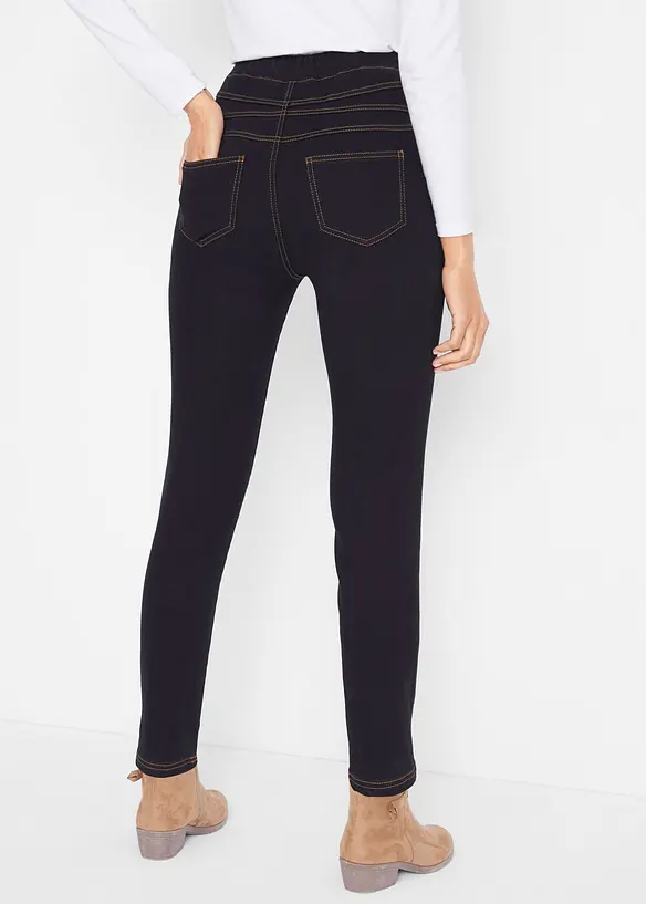 Wärmende Jeggings High Waist, Bequembund in schwarz von hinten - bonprix