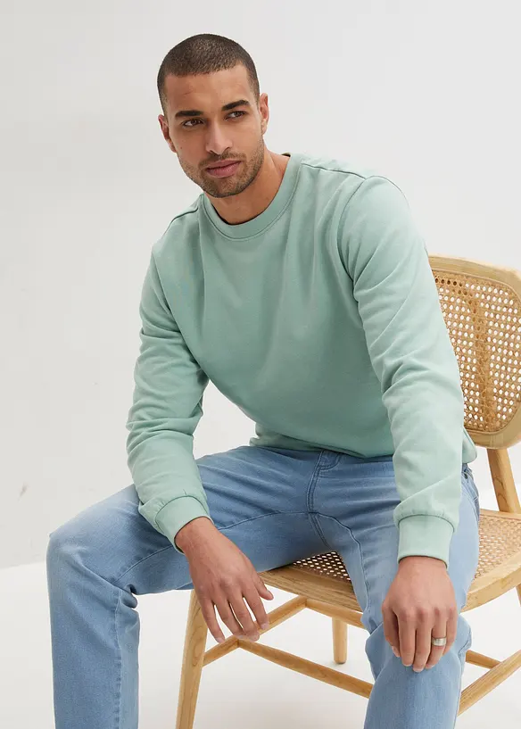 Sweatshirt aus weichem Baumwoll-Mix in grün von vorne (im Anschnitt) - bonprix