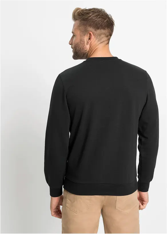 Sweatshirt in Regular-Fit in schwarz von hinten (im Anschnitt) - bonprix