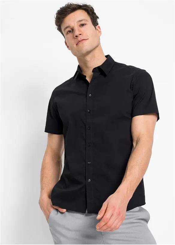Stretch-Kurzarmhemd in Slim Fit in schwarz von vorne (im Anschnitt) - bonprix