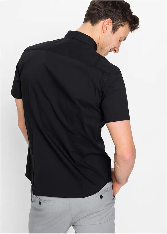 Stretch-Kurzarmhemd in Slim Fit in schwarz von hinten (im Anschnitt) - bonprix