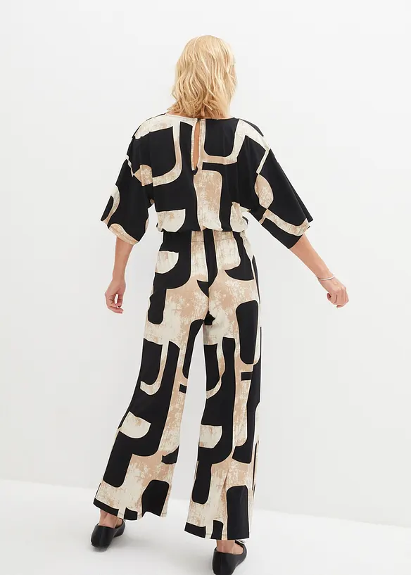 Jersey-Jumpsuit mit V-Ausschnitt in schwarz von hinten (Totalaufnahme) - bonprix