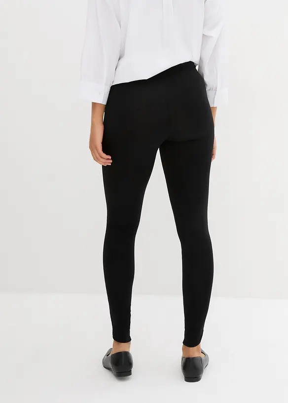Knöchelfreie Leggings in schwarz von hinten - bonprix