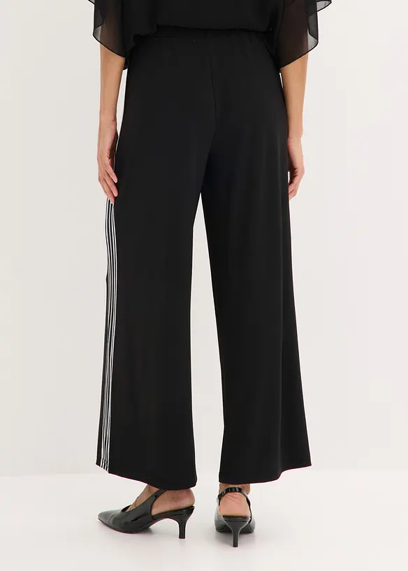Jersey-Hose mit Seitenstreifen in schwarz von hinten - bonprix