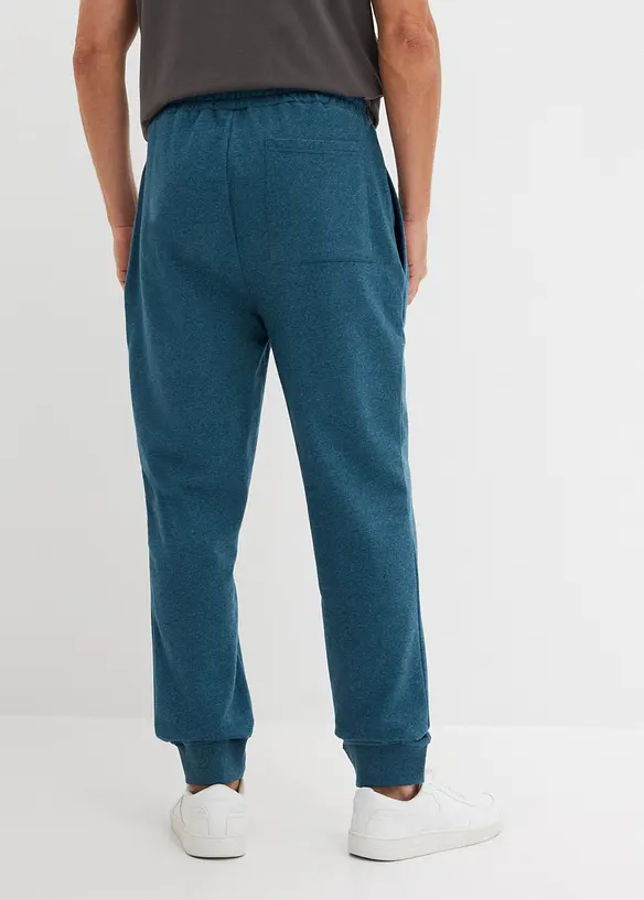 Jogginghose mit Kontrastdetails in petrol von hinten - bonprix