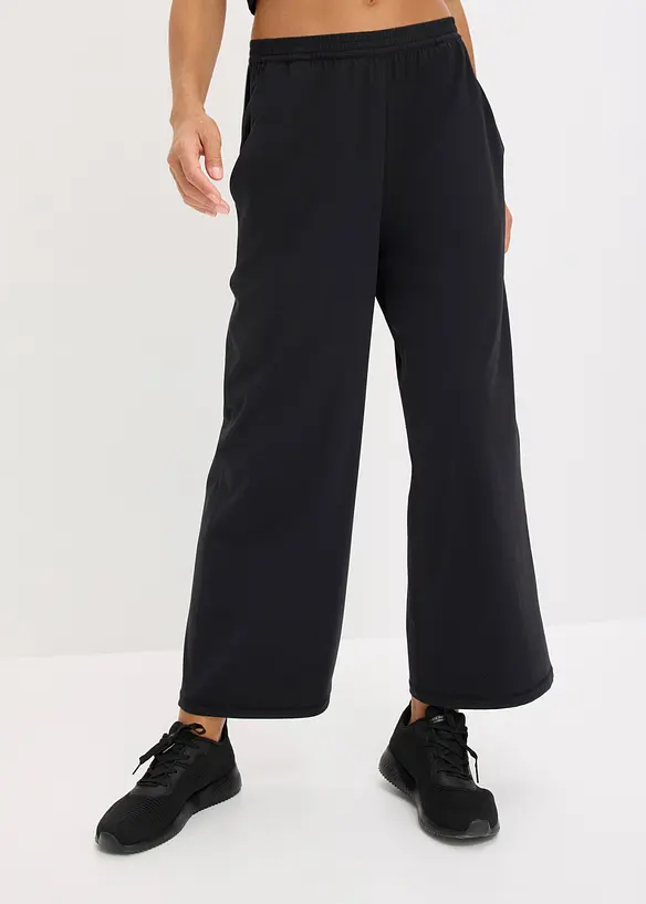 Komfort-Sporthose mit weitem Bein, schnelltrocknend in schwarz von vorne - bonprix Komfort-Sporthose mit weitem Bein, schnelltrocknend in schwarz von vorne - bonprix