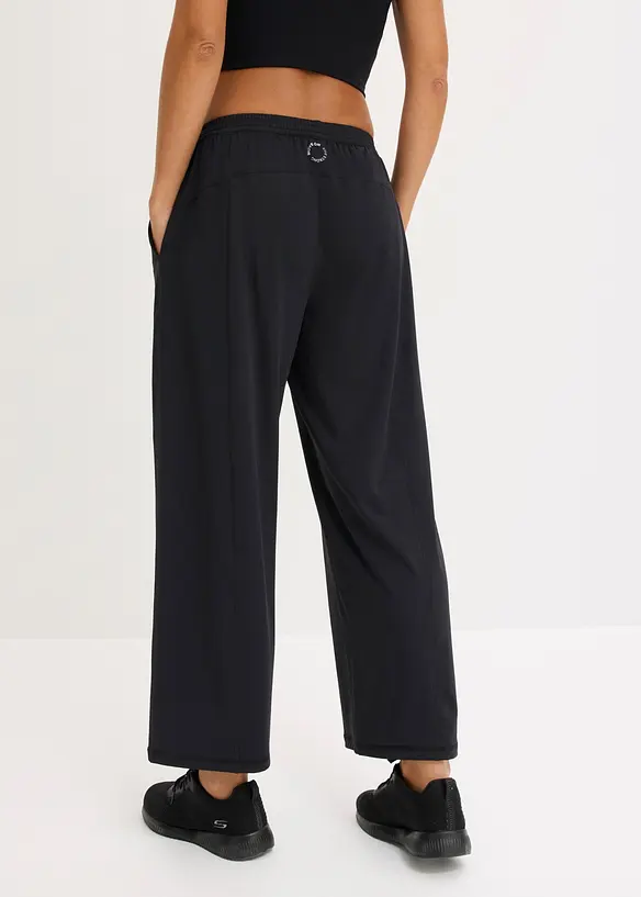 Komfort-Sporthose mit weitem Bein, schnelltrocknend in schwarz von hinten - bonprix Komfort-Sporthose mit weitem Bein, schnelltrocknend in schwarz von hinten - bonprix