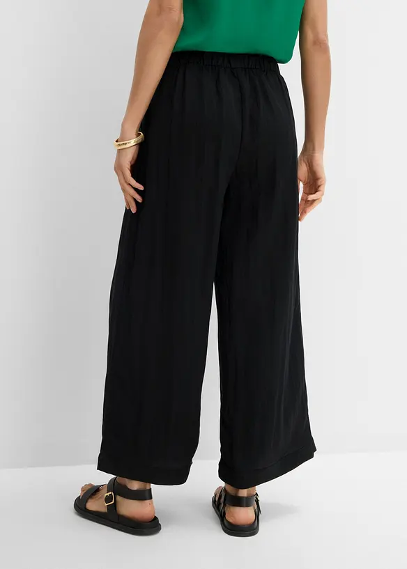 Culotte mit fließender Viskose in schwarz von hinten - bonprix