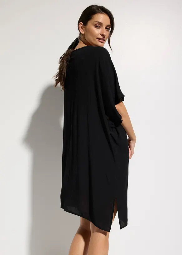 Oversize Strandtunika aus strukturiertem Crinkle in schwarz von hinten (Totalaufnahme) - bonprix Oversize Strandtunika aus strukturiertem Crinkle in schwarz von hinten (Totalaufnahme) - bonprix