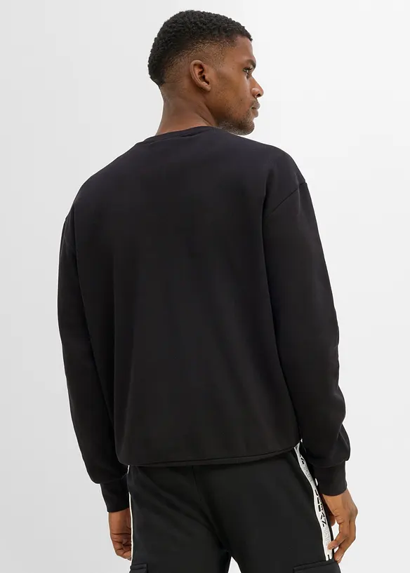 Sweatshirt aus reiner Bio Baumwolle, Loose Fit in schwarz von hinten (im Anschnitt) - bonprix