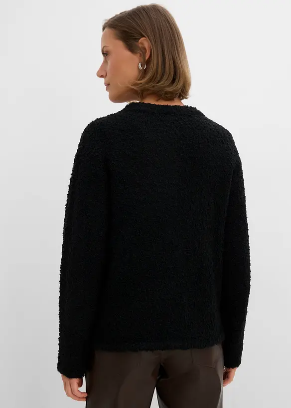 Teddy-Strickjacke in schwarz von hinten (im Anschnitt) - bonprix
