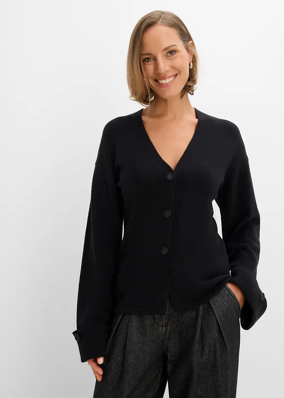 Taillierte Strickjacke aus Viskose-Mix in schwarz von vorne (im Anschnitt) - bonprix