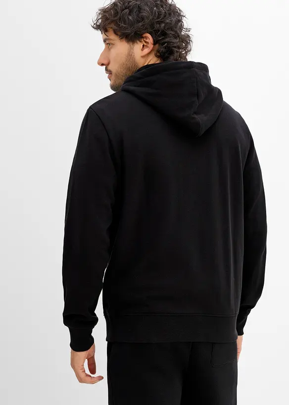 Kapuzen-Sweatjacke aus weichem Baumwoll-Mix in schwarz von hinten (im Anschnitt) - bonprix
