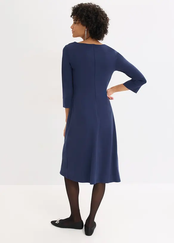 Kleid aus Punto di Roma in blau von hinten (Totalaufnahme) - bonprix