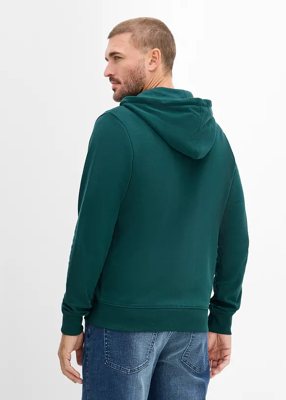 Kapuzen-Sweatjacke aus weichem Baumwoll-Mix in grün von hinten (im Anschnitt) - bonprix
