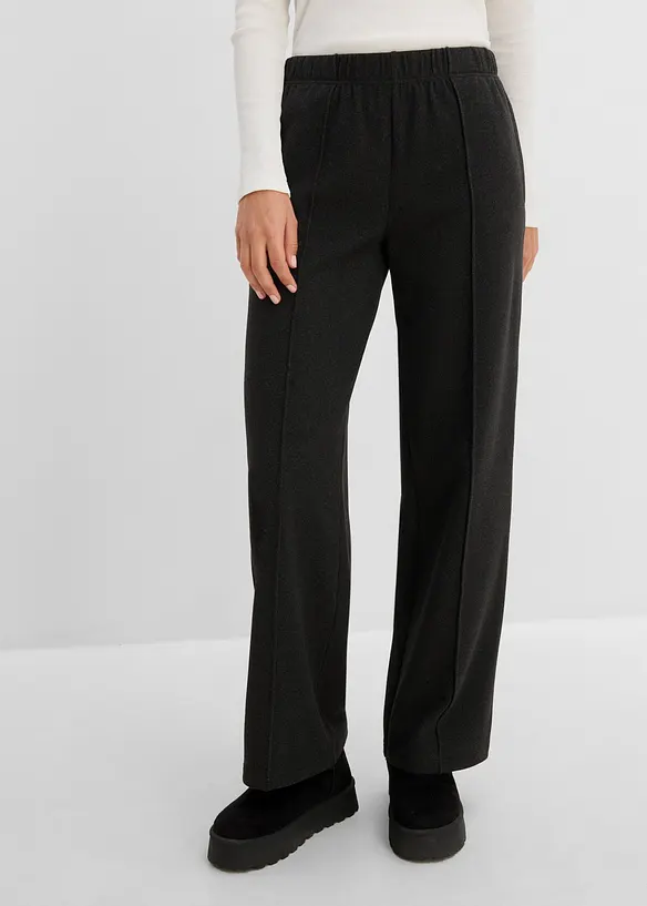 Schlupfhose aus weichem Rippjersey in schwarz von vorne - bonprix