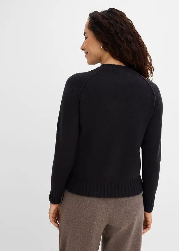 Raglan-Strickpullover in schwarz von hinten (im Anschnitt) - bonprix