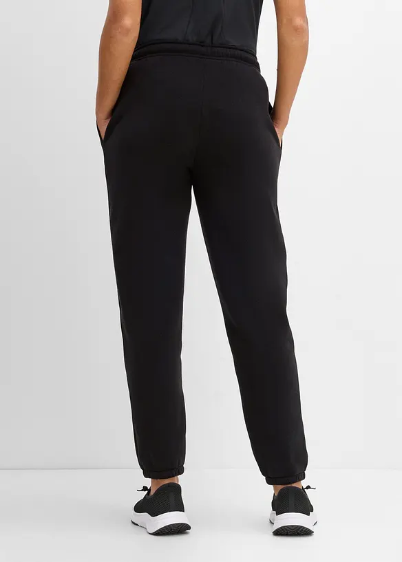 Thermo-Jogginghose, schnelltrocknend in schwarz von hinten - bonprix
