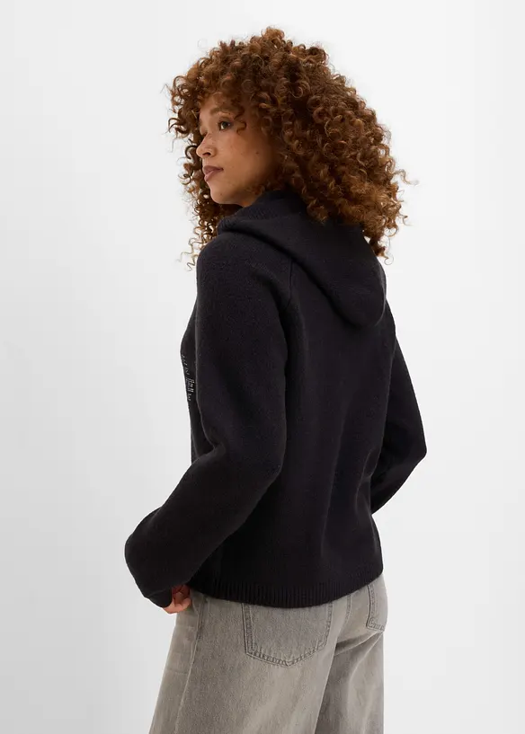 Feinstrickpullover mit Glitzersteinchen in schwarz von hinten (im Anschnitt) - bonprix